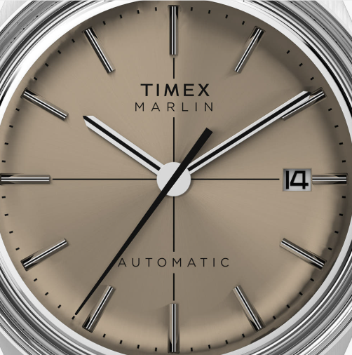 타이맥스 멀린 특유의 샴페인 톤 다이얼 위로 미니멀한 인덱스와 날짜 창이 돋보인다. / 이미지 출처: 타이맥스