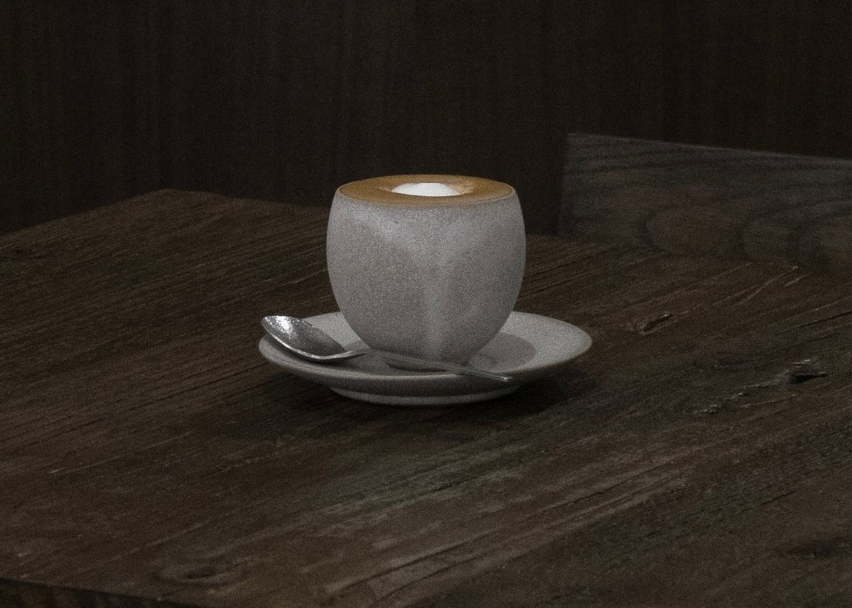 담박한 도자기 잔에 담겨 나오는 ‘크림 코르타도’는 한 모금 머금는 순간 고요한 여운을 남긴다. / 이미지 출처: 으믐 네이버지도 업체 제공 이미지