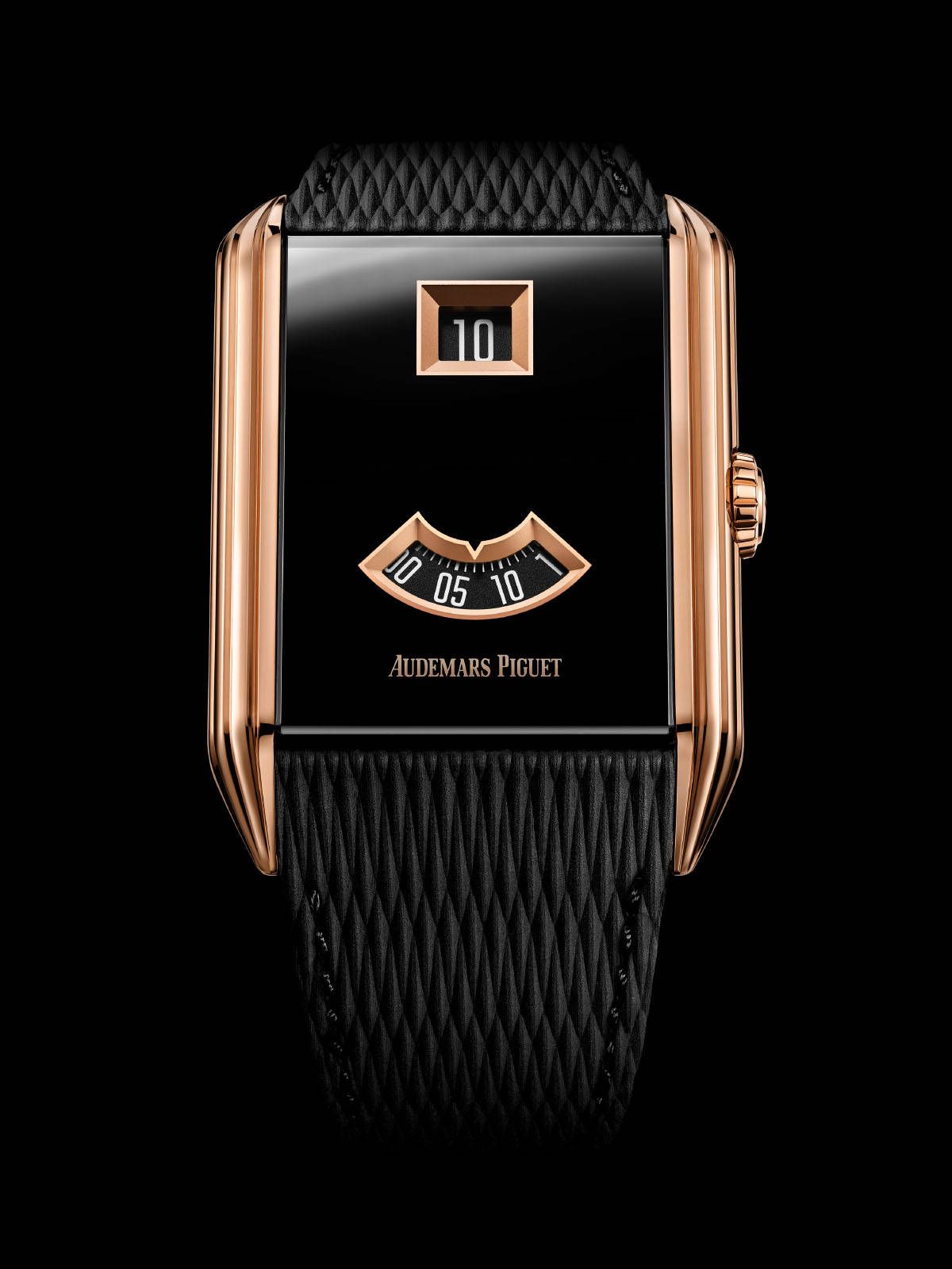 블랙 PVD 사파이어 크리스탈 다이얼에 두 개의 골드 프레임 창으로 시간을 나타내는 오데마 피게 네오 프레임 점핑 아워 / 이미지 출처: 오데마 피게