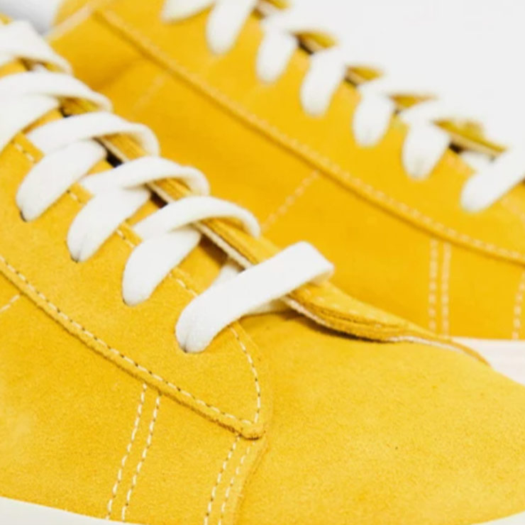 UA Sid DX trainers in og yellow, $103 USD